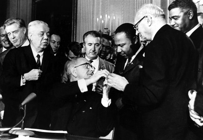 https://archive.wbhm.org/wp-content/uploads/2014/07/lbj_mlk_civilrightsact-650x450.jpg