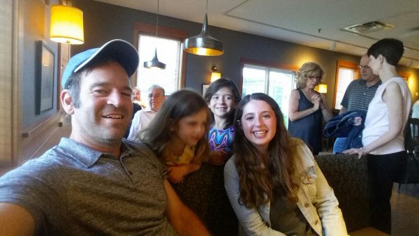 https://archive.wbhm.org/wp-content/uploads/2015/10/Paul-with-daughters-and-cousin.jpg-600x338.jpeg