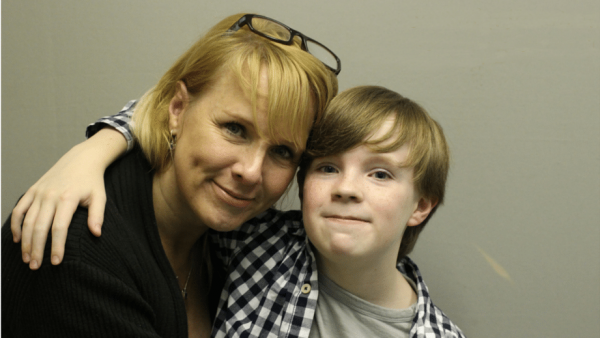 https://archive.wbhm.org/wp-content/uploads/2015/11/Jennifer-Sumner-and-her-son-Rae-Ford-600x338.png