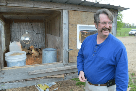 https://archive.wbhm.org/wp-content/uploads/2016/04/weld-chicken-farmer.png