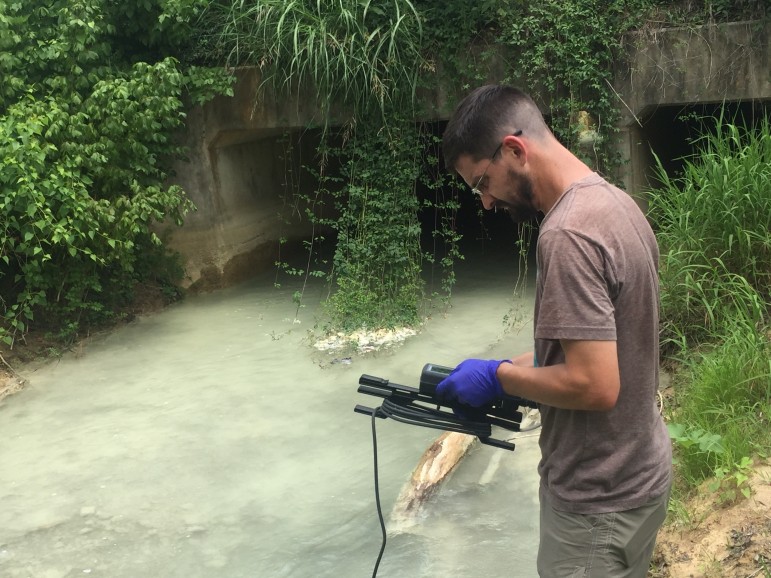 Cahaba Riverkeeper David Butler takes readings from Buck Creek.