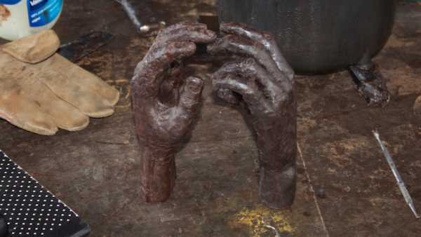 https://archive.wbhm.org/wp-content/uploads/2018/08/Metal_Hand_Sculpture_July_2018_Janae_Pierre1-e1533168333631-600x338.png