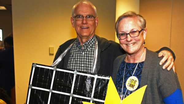 https://archive.wbhm.org/wp-content/uploads/2019/11/11-21-2019-Mobiles-John-and-Lella-Lowe-wore-their-Halloween-costumes.-She-is-the-sun-he-a-solar-panel-1024x639-1-600x338.jpg