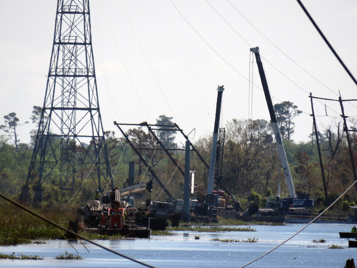 Entergy crews work to restore a transmission tower in North Lake Charles that was damaged by Hurricane Laura in August 2020.