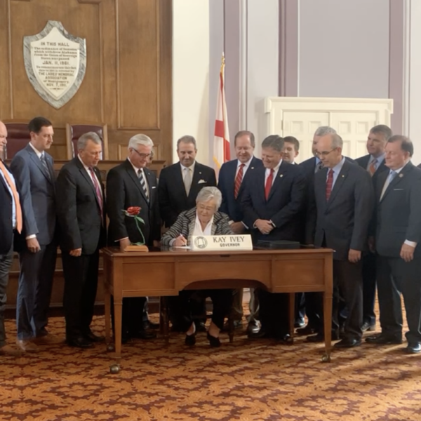 https://archive.wbhm.org/wp-content/uploads/2021/10/PIC_Ivey_Signing-600x600.png