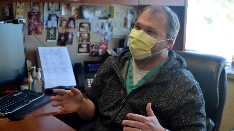 Jaymie Heard, ICU manager for King's Daughters Medical Center in Brookhaven, Mississippi, sits at his desk in his office.