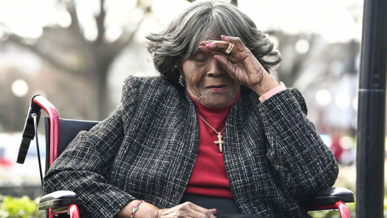 FILE - Autherine Lucy Foster reacts during the dedication ceremony for Autherine Lucy Foster Hall in Tuscaloosa, Ala., Friday, Feb. 25, 2022. Angela Foster Dickerson, Foster's daughter, says her mother died Wednesday, March 2, 2022 and said a family statement would be released. (Gary Cosby Jr./The Tuscaloosa News via AP, File)