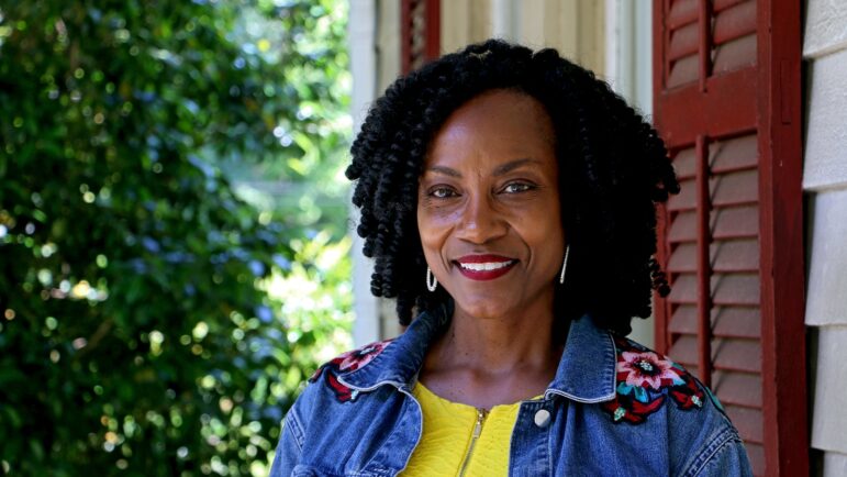 A portrait of Avis Williams is taken on the front porch of her home in Selma, Alabama.
