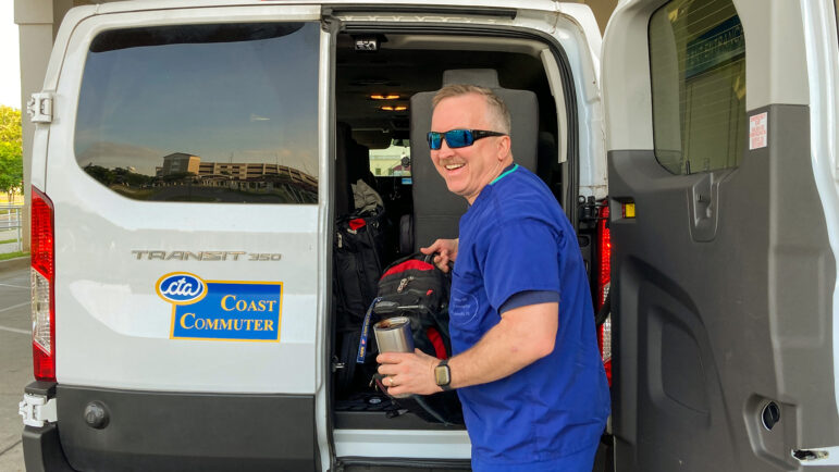 Nurse Shane Pierce unloads his bag before heading into his shift at the Biloxi VA Medical Center in Mississippi.