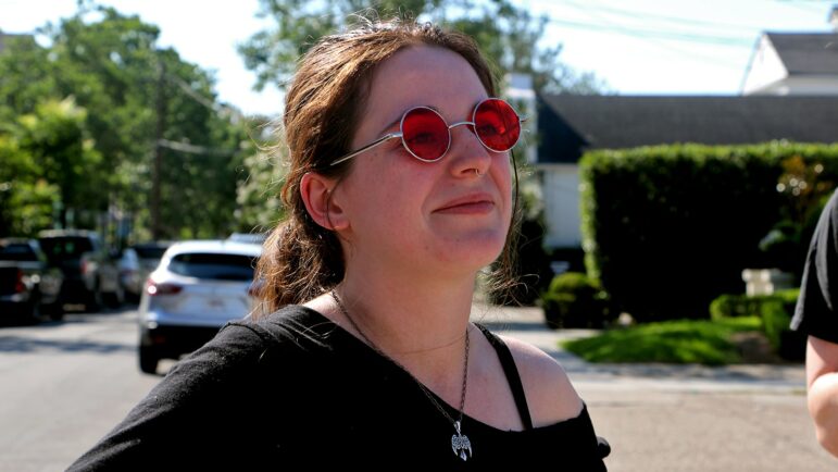 Caitlyn Pierce, a barista at the Maple Street Starbucks in New Orleans, celebrates her store’s successful unionization vote after the final tally is read.