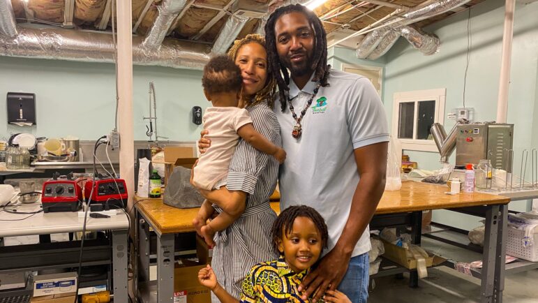 Yasmin and Eric Collins are pictured at the back of their store, Herbal Blessings, on Farish Street in Jackson, Mississippi.