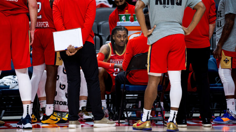 Birmingham Squadron guard John Petty, Jr. sits for a timeout during a Squadron game in the 2021-2022 NBA G League season.