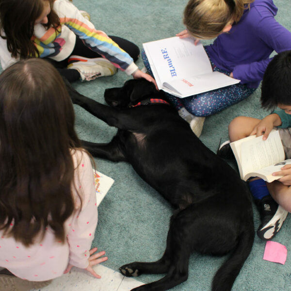 https://archive.wbhm.org/wp-content/uploads/2023/02/Merlin_and_kids_at_West_Elementary-scaled-e1676052355217-600x600.jpg