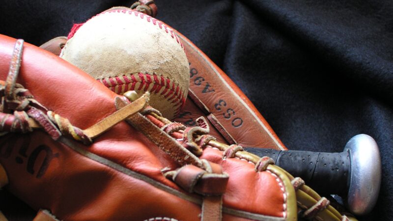 https://archive.wbhm.org/wp-content/uploads/2023/05/baseball-glove_and_bat-e1683231421154-800x450.jpg