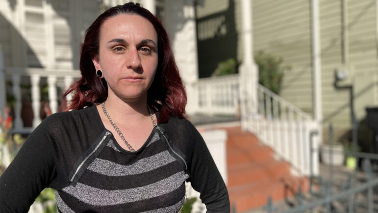 Melissa Vegas stands outside the quadplex one-bedroom apartment she rents in New Orleans, Louisiana, on April 30, 2023.