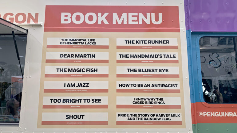 The “menu” of free banned books offered by the Banned Wagon is displayed on the converted ice cream truck outside of Baldwin & Co. in New Orleans on Oct. 5, 2023.