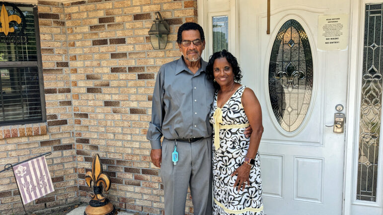 Paul and Florence Jordan pose for a picture outside their home in Waveland, Mississippi, on Sunday, August 27, 2023.