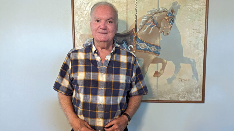 Jimmy McGuire poses for a photo inside his Clermont Harbor, Mississippi, home on Monday, August 28, 2023.