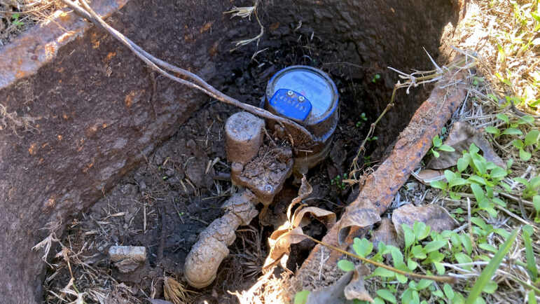 An image of James Henley's water meter for the home he uses as his law office in Jackson, Mississippi, on Dec. 5, 2023.