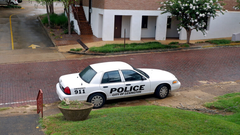 A Lexington Police Department officer’s vehicle sits outside the town’s police station and courthouse on July 18, 2023.