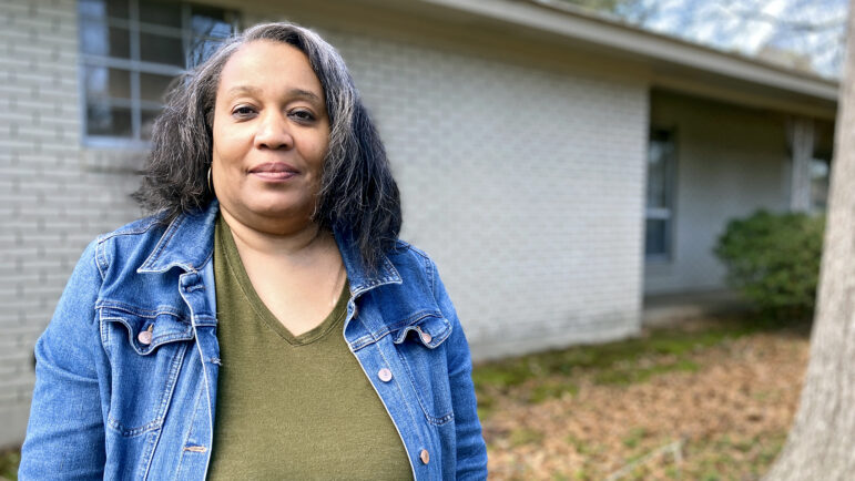 Catherine Lacy stands outside her Jackson, Mississippi, home on Feb. 23, 2024.