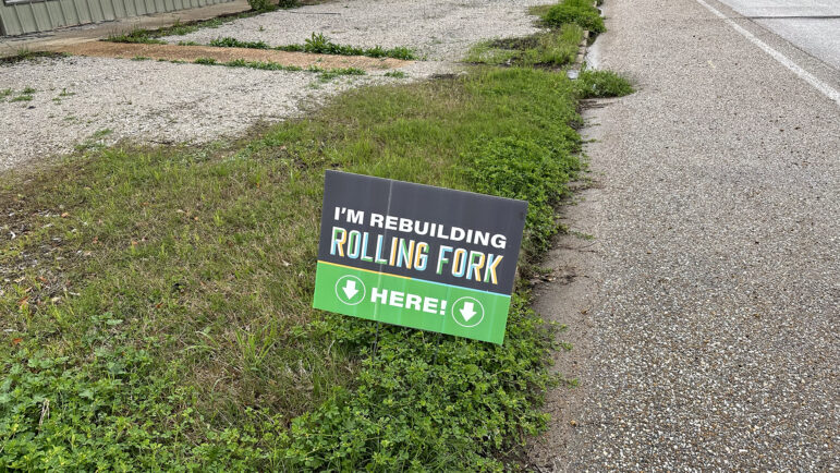 A sign outside a business in downtown Rolling Fork on Friday, March 22, 2024.