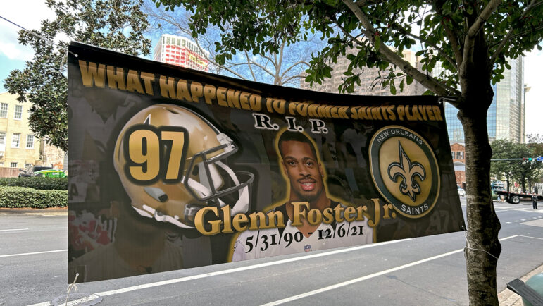 A banner honoring Glenn Foster Jr. hangs outside the Hale Boggs Federal Building on Poydras Street in New Orleans on Sunday, February. 9. 2025.
