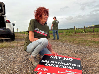 A death penalty opponent protests the execution of Alan Miller by nitrogen gas in Atmore, Alabama, on Sept. 26, 2024.