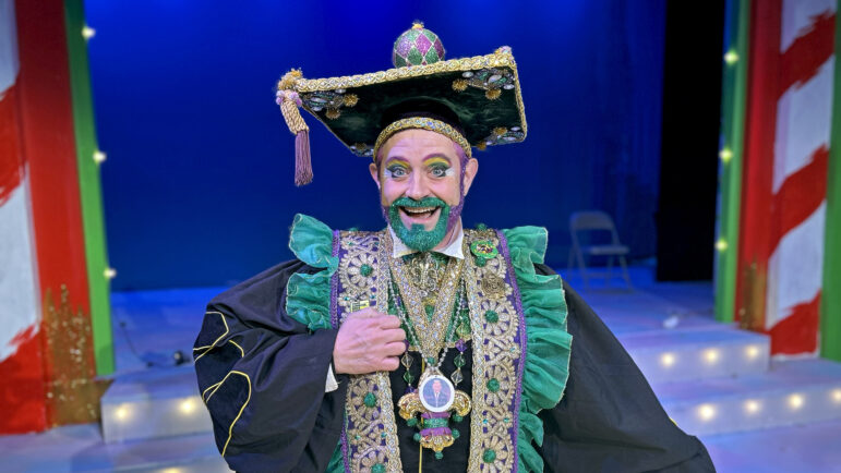 Vatican Lokey, better known locally as Professor Carl Nivale, stands on stage at the Rivertown Theaters for the Performing Arts in New Orleans on Saturday, February 1, 2025.