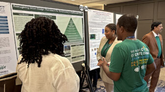 Attendees at the 10th HBCU Climate Change Conference look at posters created by students based on their projects on Saturday, March 8, 2025 in New Orleans.
