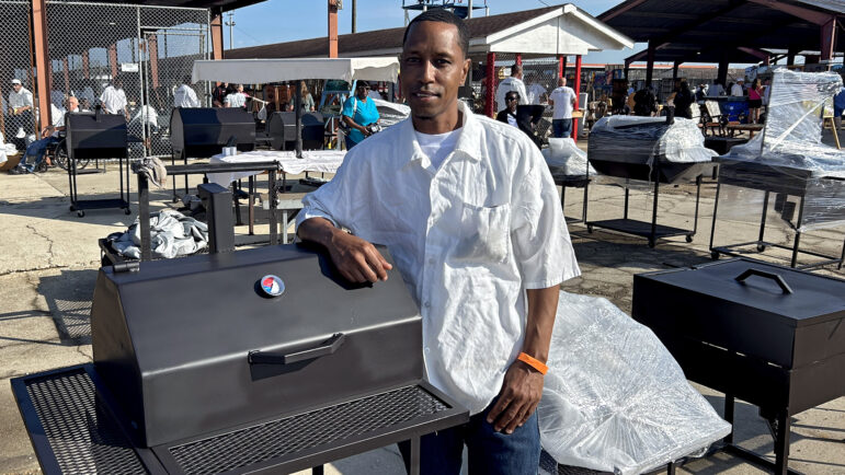 Charles Grace stands by barbecue pits he built himself at the handicrafts fair outside the Angola Prison Rodeo at Louisiana State Penitentiary in Angola, Louisiana, on April 26, 2025.