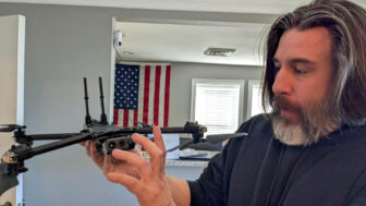 Jansen Cohoon inspects a drone at the V2 Forensics office in Gulfport, Mississippi, on January 23, 2025.