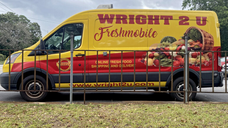 A van advertises Wright’s Market's Wright 2 U service in Opelika, Alabama, on July 17, 2025.