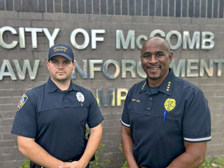 Officer Tyler Harvey and Chief Juan Cloy stand outside of the McComb Police Department in McComb, Mississippi, on Wednesday, June 11, 2025.