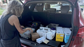 Harm reduction worker Suzanne Smith loads up her SUV with supplies in Birmingham, Alabama, on April 6, 2025.