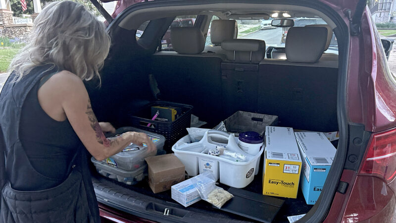 Harm reduction worker Suzanne Smith loads up her SUV with supplies in Birmingham, Alabama, on April 6, 2025.