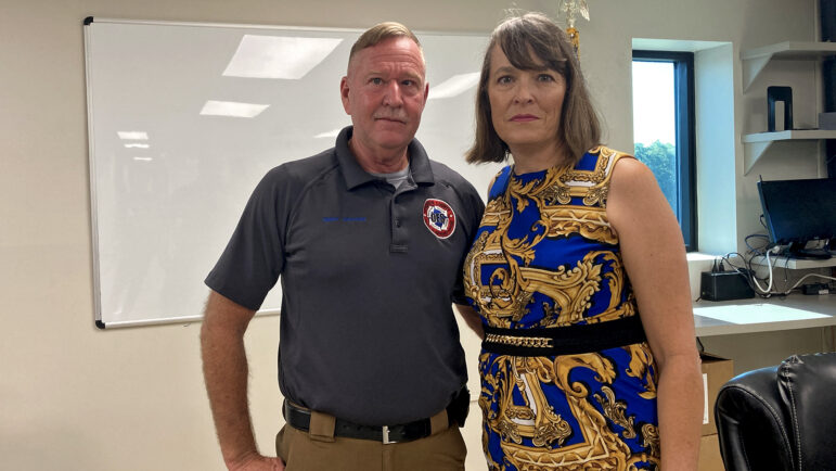 Terry Jackson and Paige Roberts pose for a photo at the Jackson County Emergency Operations Center in Pascagoula, Mississippi, on Aug. 14, 2025.