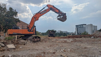 Heavy equipment takes apart Huntsville’s former city hall site after the a new building was constructed. September 22, 2025.
