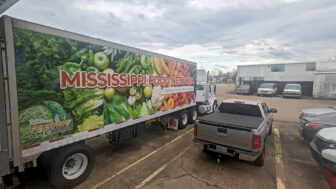 A delivery truck sits outside Mississippi Food Network’s warehouse in Jackson.